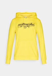 Gul hoodie med et sort grafisk logo "DORTMUND" med "BVB 09". Snorhætte og kængurulomme. Blødt stof, ribbede manchetter og kant.