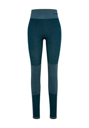 Cyklamen leggings med høj talje, med varierede teksturer og farveblokering. Lavet af strækbart materiale for komfort og bevægelse.