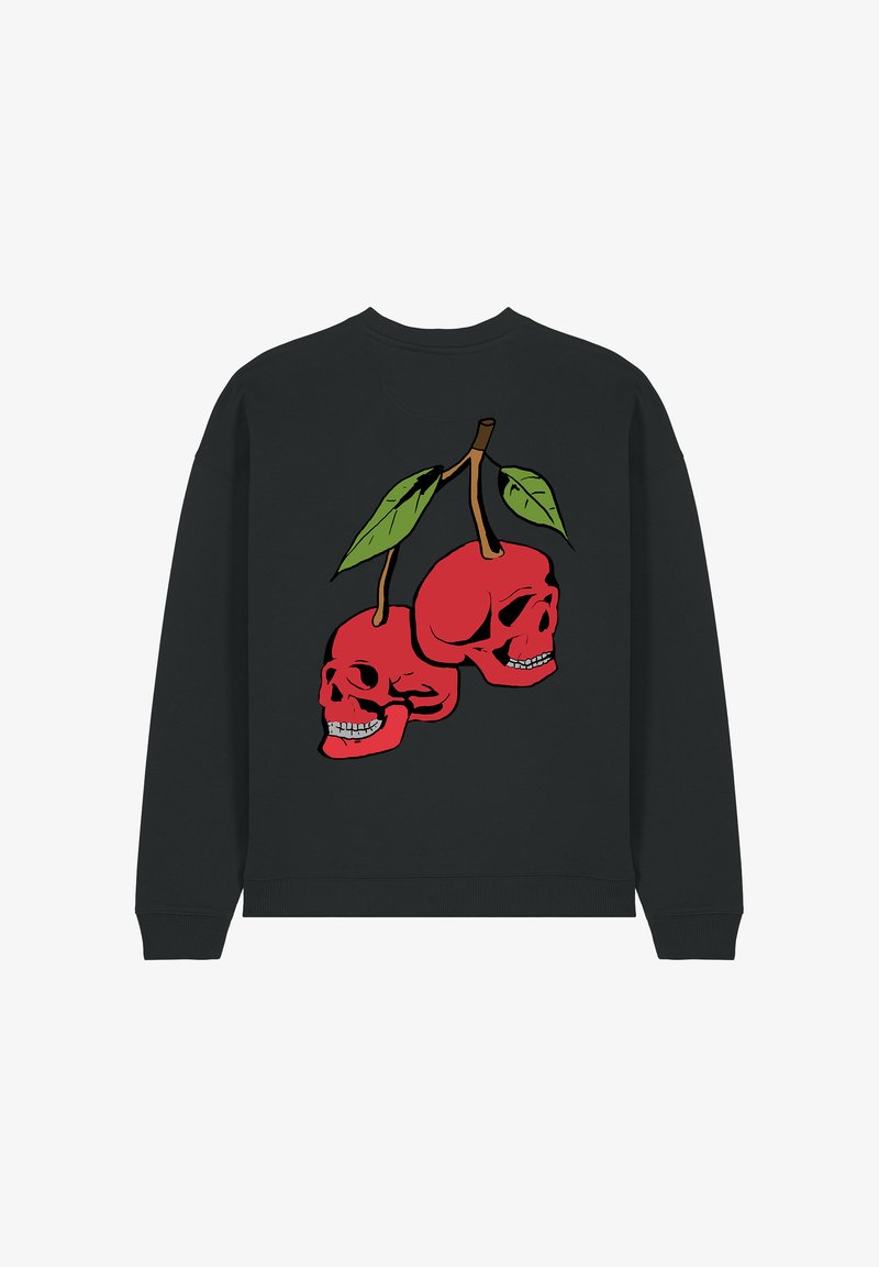 Sweatshirt noir avec un graphique de deux crânes rouges entourés de feuilles vertes. Le design est centré et bien en vue, avec une coupe décontractée.