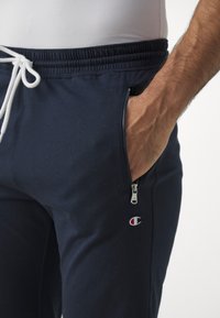 Champion ICON PANTS - Tepláky - navy