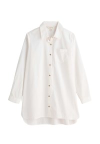 Biała koszula z długim rękawem, zapinana na guziki, z kołnierzykiem, jedną kieszenią na piersi i okrągłym dołem. Posiada złote guziki z przodu.