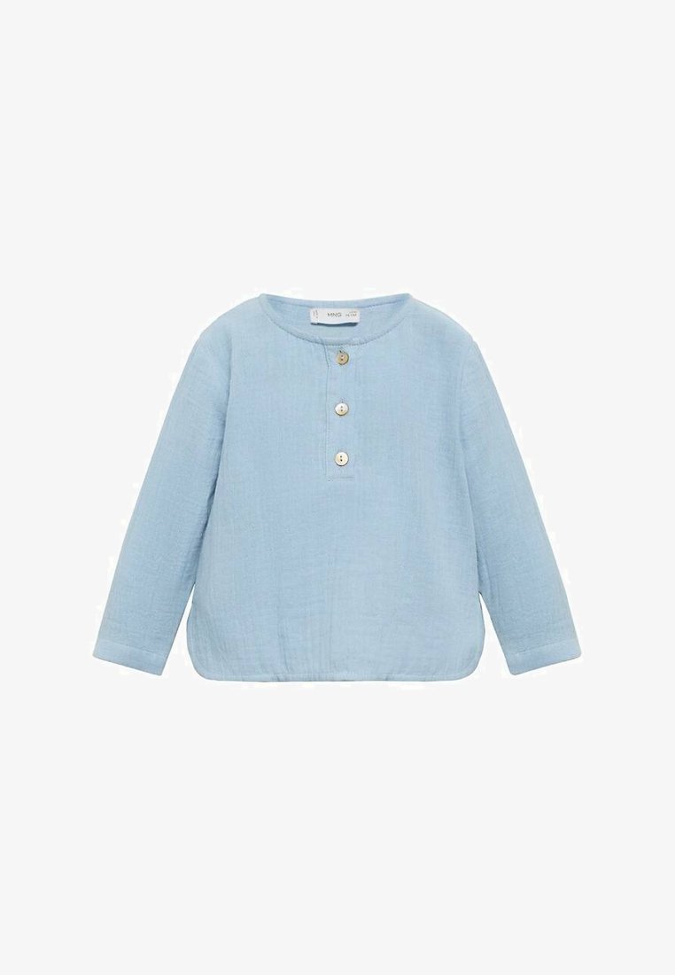 Light blue long-sleeve shirt in textured fabric with a rounded neckline and three-button placket at the front. Straight hem.