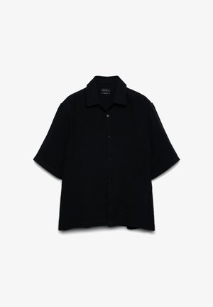 Camicia nera a maniche corte con bottoni e colletto, distesa, vista frontale e chiusura centrale con bottoni.
