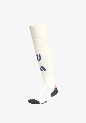 Weißer Fußballsocken mit marineblauem Logo und Akzenten, ausgestattet mit einer rosa Ferse und grauem Zehenbereich, gefertigt aus einem dehnbaren, strukturierten Material.