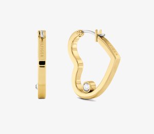 Gold hoop earrings with a wavy design, featuring a small clear stone and engraved branding on one side. Smooth texture and shiny finish.