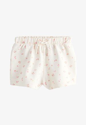 Białe szorty z elastycznym pasem, małym różowym kwiatowym wzorem i ściągaczem z przodu, zaprojektowane dla dzieci.