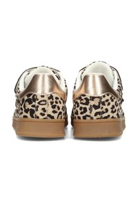 Leopard print sneakers with a beige fabric upper, metallic gold heel accents, and a brown rubber sole, featuring a smooth texture.