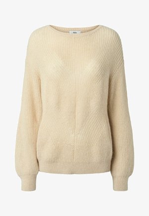 Beige kudumitega kampsun, millel on lahti sobivus, lai kaelus ja pikad varrukad. Ühtlane tekstuur, ribatud mansetid ja alläär.