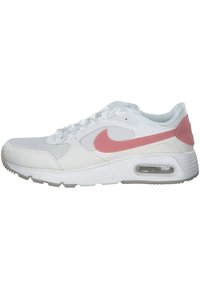Zapatillas Nike en blanco y rosa. Las características incluyen una parte superior de piel suave, suela de goma y una unidad de amortiguación de aire visible en el talón.