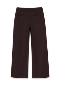 Wide-leg trousers made of solid dark brown fabric. Features two back pockets and a smooth finish. Tailored waistband without visible closure.