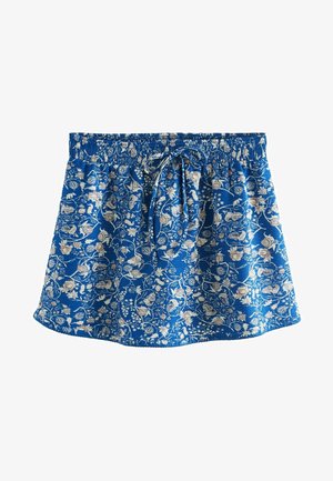 Gonna a fiori blu con vita arricciata elasticizzata e coulisse. Presenta intricati motivi floreali bianchi e rosa. Tessuto testurizzato.