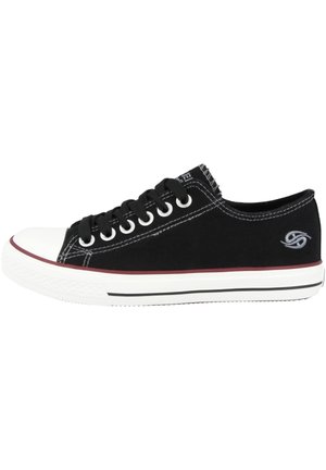 Black canvas sneaker with white rubber toe cap, black laces, red and white sole accents, and embroidered logo on the side.