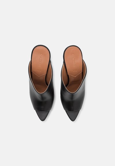 Black leather mules with a pointed toe and smooth texture. Tan insoles feature embossed brand name. Open back design for easy wear.