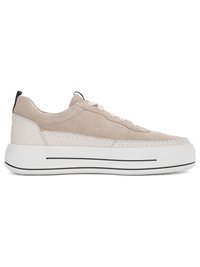 Beige suede lace-up sneaker with white thick sole, black stripe detail, and pull tabs on heel and tongue.