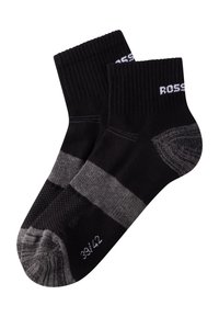 Musta nilkkasukat, joissa on ribbausreunus, harmaita raitoja ja teksturoitu kuvio. Koko on merkitty varpaassa 39/42.