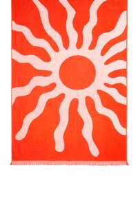 Tkanina z żywym pomarańczowym tłem oraz dużym różowym wzorem słonecznym. Materiał wydaje się miękki, z frędzlami na krawędzi.