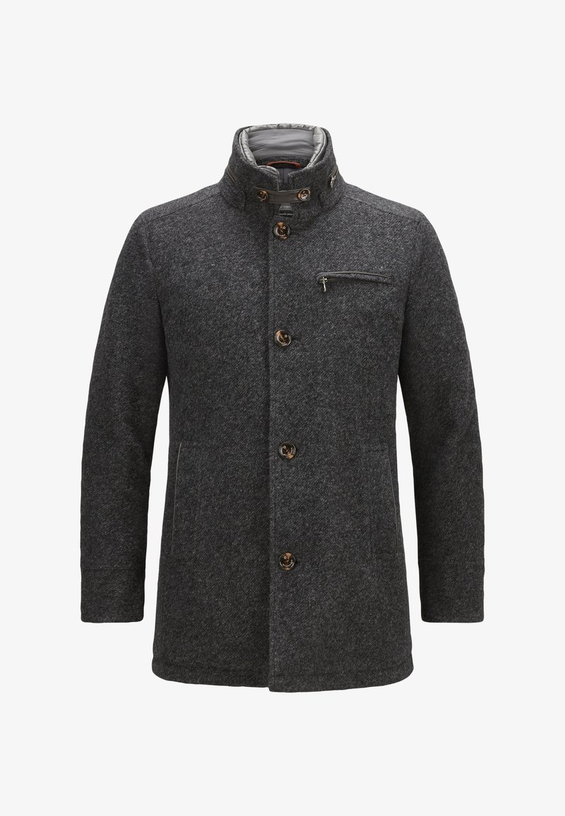 Grau-wollener Mantel mit hohem Kragen, zwei seitlichen Taschen und einer Brusttasche mit Reißverschluss. Ausgestattet mit braunen Knopfbeschlägen und einem glatten grauen Futter.