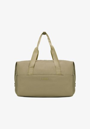 Beige duffel bag made of durable fabric, featuring two top handles, a zip closure, and a horizontal logo patch on the front.