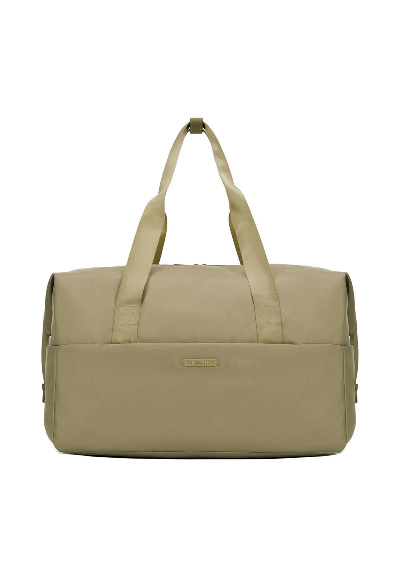 Sac de sport beige en tissu durable, avec deux poignées supérieures, une fermeture éclair et un patch logo horizontal à l'avant.