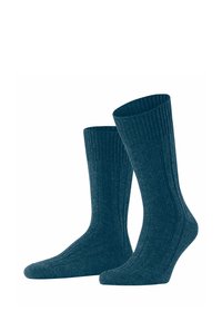 Rippstricksocken in dunkelblauer Farbe, mit einem hohen Bündchen und einem weichen, strukturierten Stoff für hohen Tragekomfort. Geeignet für Freizeit- oder formelle Anlässe.