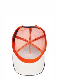 Kepurė su oranžiniu tinkleliu viduje ir baltu priekiu. Turi plokščią skydelį, reguliuojamą snapback ir spausdintą ženklinimą vidiniame dirže.