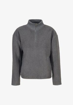 Sudadera de forro polar gris con cuello half-zip, mangas largas y bolsillos laterales. Tejido texturizado con una apariencia suave y acogedora.
