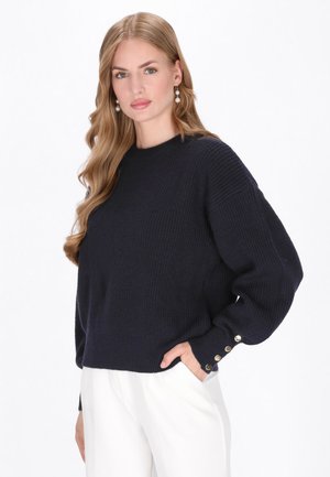- Sweter