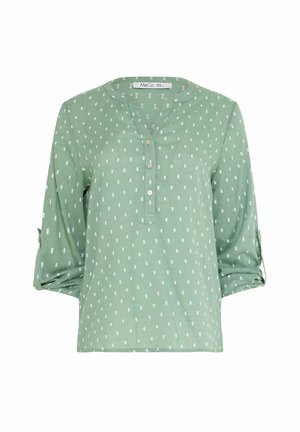 Camicia a maniche lunghe verde chiaro con motivo a puntini rettangolari bianchi, tre bottoni davanti e maniche arrotolate fissate con asole.