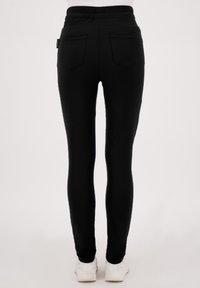 JE M'APPELLE PERFECTE TRAVEL - Broek - zwart