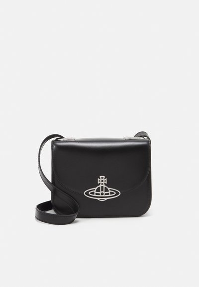 Black leather crossbody bag featuring a silver emblem on the front, with a smooth texture and adjustable strap.