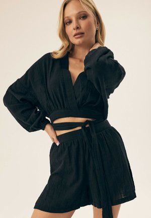 SEASIDE - Shorts - black