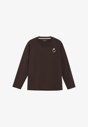 Braun langärmliges Shirt aus weichem Stoff mit einem kleinen weißen Smiley-Grafik auf der Vorderseite und gerundetem Ausschnitt.
