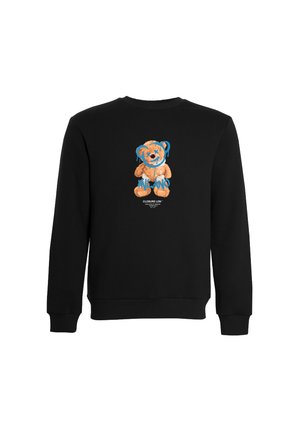 Schwarzer langärmeliger Pullover mit einem blau durchgestrichenen Teddybär-Motiv und dem Schriftzug „MILANO“ darüber in der vorderen Mitte.