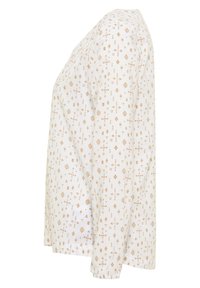 Chemise blanche à manches longues avec un motif géométrique beige, vue de côté, présentant de petites formes en losange et en flèche.