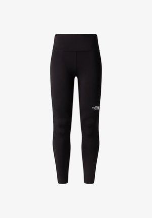 Leggings negros con una cintura alta, hechos de una tela suave y elástica. Un pequeño logo blanco está ubicado en la parte inferior de la pierna.