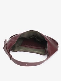 Maroon leather shoulder bag with a spacious interior, green fabric lining, zipper closure, and adjustable strap. Includes a small inner zip pocket.