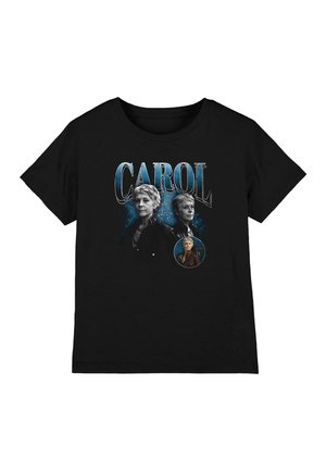 Black t-shirt with blue "CAROL" text and three images of a short-haired older woman in different poses and outfits.