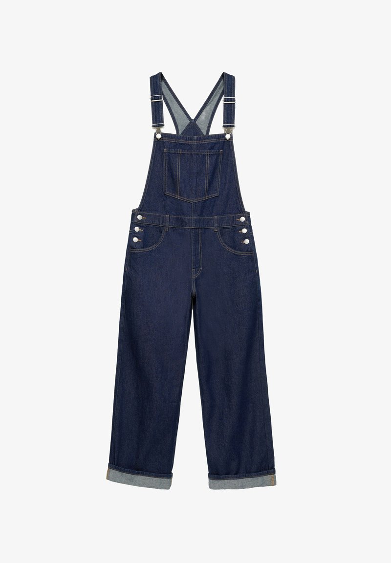 Salopette en denim bleu foncé avec bretelles réglables, poche poitrine avant, boutons latéraux et bas de pantalon retroussés.