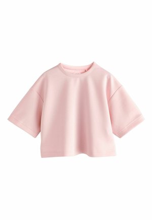Felpa corta rosa chiaro a maniche corte con scollo tondo e vestibilità comoda, esposta su sfondo bianco.
