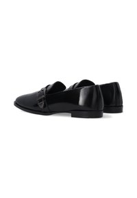 Schwarze Lederloafers mit glatter Oberfläche, flacher Sohle und dekorativem Riemendetail. Runde Zehenform und müheloses Anziehen.