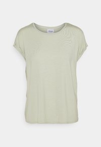 T-shirt corto beige chiaro a maniche corte con risvolti e scollatura rotonda, esposto su uno sfondo bianco semplice.