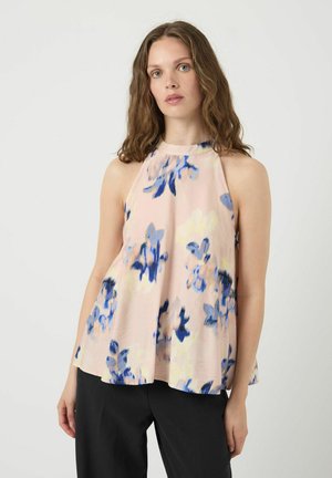 Top a halter floreale rosa con motivi astratti blu e crema. Design fluido con una vestibilità ampia, realizzato in tessuto leggero.
