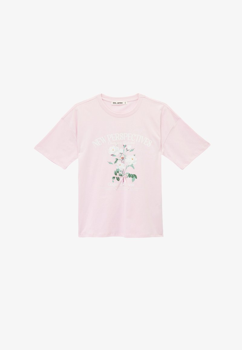 T-shirt en coton rose à manches courtes, arborant un imprimé floral et le texte "NOUVELLES PERSPECTIVES" en blanc au-dessus d'un motif central.