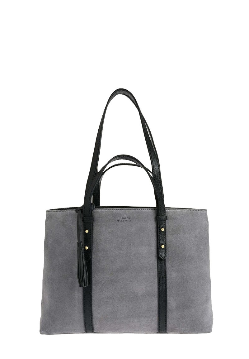 Sac fourre-tout en suède gris avec deux poignées en cuir noir, garniture en cuir noir et détail à pampilles.