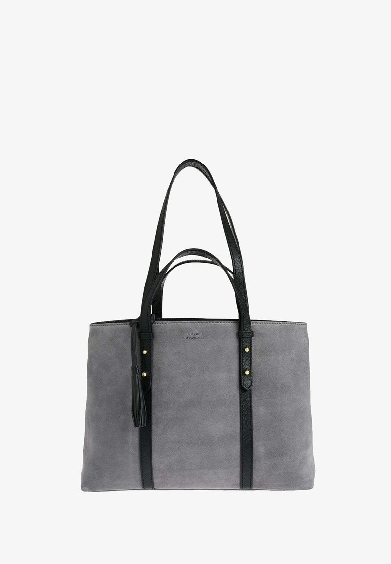 Sac fourre-tout en suède gris avec deux poignées en cuir noir, garniture en cuir noir et détail à pampilles.