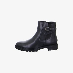 Black leather ankle boot with side buckle strap, elastic panel, and thick lug sole, shown in profile facing left.