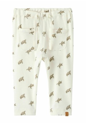 Cream-colored toddler pants with brown sea turtle print, elastic waistband, drawstring, and two front pockets.