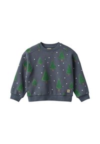 Marineblå genser med mønster av grønne trær og hvite snøfnugg. Ribbet mansjetter og nederkant, med en liten etikett på nederste front.