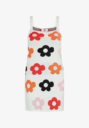 Valkoinen hihaton mekko, jossa on suuria kukkakuviota punaisista, oransseista, mustista ja vaaleanpunaisista kukista sekä neliön muotoinen pääntie.