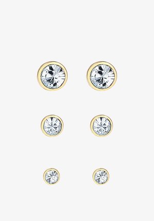 Naušnice u zlatnoj boji s kristalima prozirne boje u tri veličine, svaki postavljen u okrugli okvir. Glatka metalna završna obrada.
